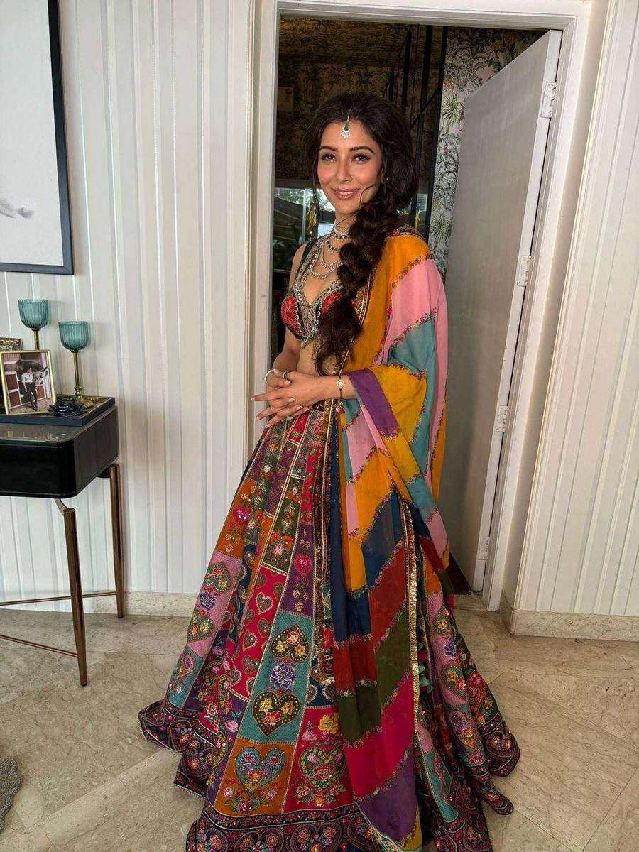 Dr. Jai Madaan, styled by Tanya Jain in a multicoloured patchwork lehenga
