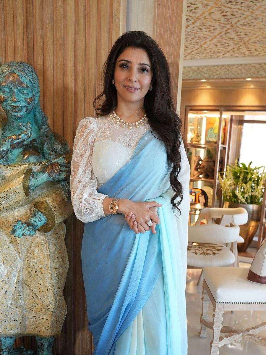 Dr. Jai Madaan, styled by Tanya Jain in a blue ombré saree with a lace blouse