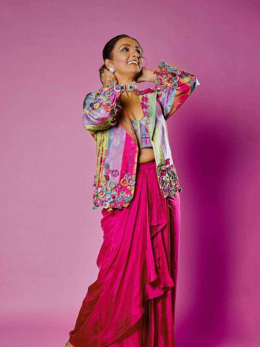Shanthi Priya, styled by Tanya Jain in the same look, mid-stride